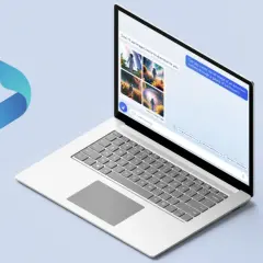 El logo de Bing junto a una laptop muestra cómo el generador de imágenes de Bing crea arte visualmente impactante.
