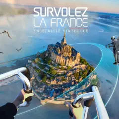 Vue aérienne du Mont-Saint-Michel en réalité virtuelle. Un avis FlyView pour une expérience immersive inoubliable.