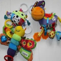Kolorowe tomy Lamaze: gąsienica i osiołek, pełne tekstur i dźwięków, gotowe do zabawy.
