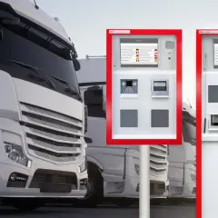 LKW-Flotte im Yard. Terminals mit Sprachauswahl und Scannern für die Logistik.