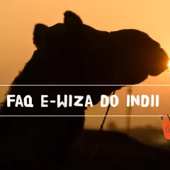 Zachód słońca nad Indiami, wielbłądy i tekst "FAQ E-wiza do Indii".