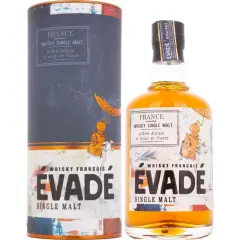 Bouteille et étui de whisky français ÉVADE, le meilleur whisky français, single malt cultivé, distillé et vieilli en France.