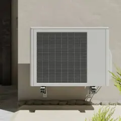 Unité extérieure de clim 2,5 kW, idéale pour une surface de 25 à 35 m². Installée près d'une porte d'entrée moderne.
