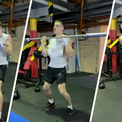 A boxer trains with dumbbells, a barbell, and a medicine ball, showing that boxers lift weights to build strength and power.