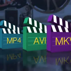 Three clapperboards labeled MP4, AVI, and MKV stand in a row, reflecting on a dark surface.