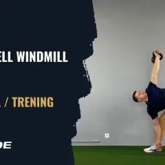 Mężczyzna wykonuje ćwiczenie windmill z kettlebell. Poprawna technika i trening.