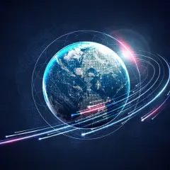 Ziemia otoczona siecią połączeń, symbolizującą globalną komunikację i przepływ danych, jak w protokole tcp.