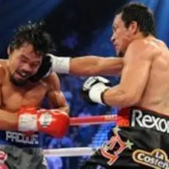 Boxer lands a powerful punch, showcasing the skill of one of the best counter punchers in boxing.