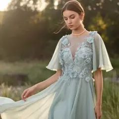 Stylizacje dla matki weselnej: elegancja, która nie przyćmi panny młodej