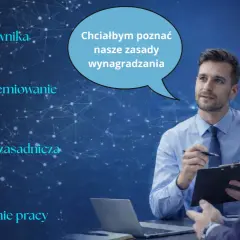 Dwóch mężczyzn w garniturach rozmawia. Jeden z nich trzyma notatnik i długopis, a nad jego głową znajduje się dymek z tekstem.