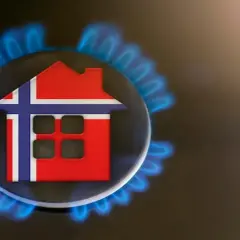 Symbol domu z flagą Norwegii na palniku gazowym. Zastanawiasz się, ile kubików gazu na miesiąc zużywa norweski dom?