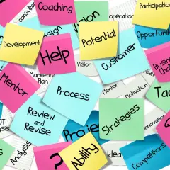 Sticky notes with business terms like "Strategy," "Team," and "Development" offer good survey comments examples for project feedback.