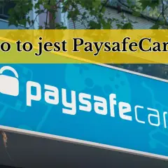 Niebieski szyld z napisem "paysafecard" i pytaniem "Co to jest Paysafecard?". To kod PSC, który ułatwia płatności online.