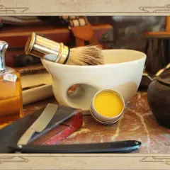 Alles für die Bartpflege: Rasierpinsel, Schale, Öl und eine kleine Dose, die perfekt zum pomade selber machen ist.