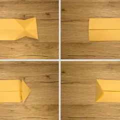 Kroki tworzenia prostego koszyka z papieru. Żółty papier składany na drewnianym tle.