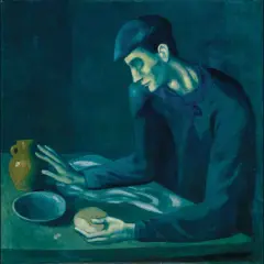 A man in a cap, characteristic of Picasso's Blue Period, sits at a table with a jug and bread, his face illuminated by a somber, blue light.