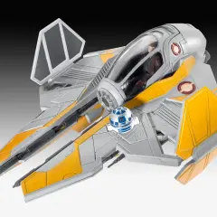 Model statku kosmicznego star wars starfighter w kolorze szaro-żółtym, z droidem R2-D2 na pokładzie.
