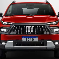 Czerwony Fiat Toro, jeden z nowoczesnych fiat modele, z charakterystycznym grillem i światłami LED.