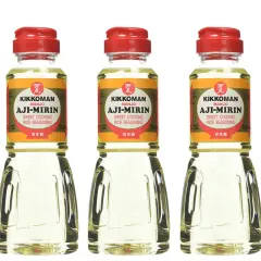 Five bottles of Kikkoman Aji-Mirin, a sweet cooking rice seasoning. Mirin is used to add sweetness and glaze to Japanese dishes.