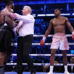Referee separates boxers Anthony Joshua and Dillian Whyte. Judges score boxing matches based on punches landed, defense, and ring control.