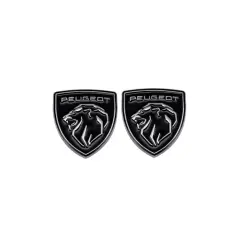 Dwa emblematy Peugeot z lwem, idealne jako klej do emblematów samochodowych.