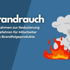 Brandlast: Maßnahmen zur Reduzierung der Gefahren für Mitarbeiter durch Brandfolgeprodukte. Flammen und Rauch steigen auf.