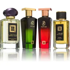 Kolekcja sześciu luksusowych perfum niszowych, każdy w eleganckiej butelce z ozdobnym korkiem.