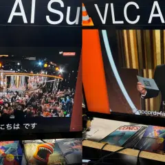 Ricky Gervais at the Golden Globes, with VLC automatic subtitles displaying in Japanese and French.