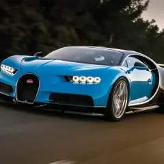Niebieski Bugatti Chiron pędzi po drodze. Marzenie o takim aucie, choć jego bugatti cena jest astronomiczna, jest dla wielu.