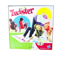 Das Spiel Twister fordert Geschicklichkeit und Balance. Kinder und Erwachsene verrenken sich auf der bunten Matte.