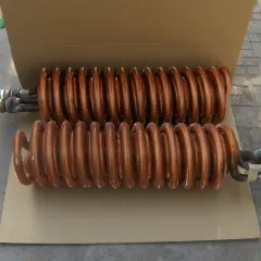 Dwie miedziane wężownice do kominka, gotowe do montażu.