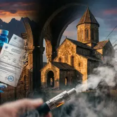 Gruzja: zakazane leki i dokumenty za kratami, obok starożytnej cerkwi i gór. Dym z e-papierosa unosi się w powietrzu.
