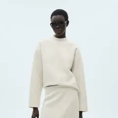 Conjunto falda y jersey punto Mango: El look que transforma tu armario