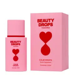 Różowe opakowanie i buteleczka serum Calm Drops z napisem "Ceramidy + CICA". Ceramidy na co? Na ukojenie i regenerację skóry.