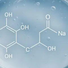 Struktura chemiczna hialuronianu sodu na błękitnym tle z pęcherzykami powietrza.