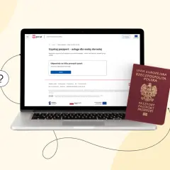 Planujesz podróż do Albanii? Sprawdź, czy do Albanii potrzebny jest paszport, na stronie gov.pl. Obok laptopa leży polski paszport.