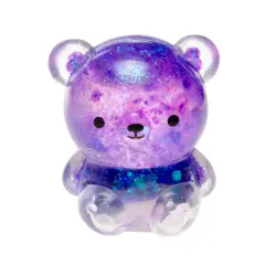 Uroczy, fioletowy gniotek squishy w kształcie misia z brokatem.