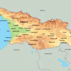 Mapa polityczna Gruzji z zaznaczonymi miastami i sąsiadującymi krajami. Gdzie leży Gruzja? Między Morzem Czarnym a Morzem Kaspijskim, na styku Europy i Azji.