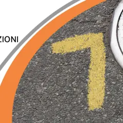 Segnale giallo indica l'ingresso a **spazi confinati**. Coperchio tombino in primo piano. 7 considerazioni di sicurezza.