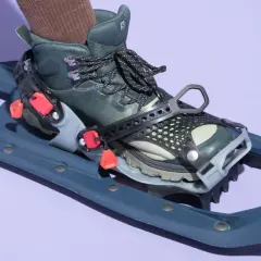 A boot is attached to a snowshoe. You do not need special boots for snowshoes; hiking boots work well.