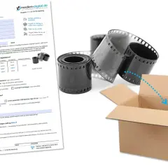 Negative digitalisieren lassen: Filmrollen und Kartonbox für den Versand.