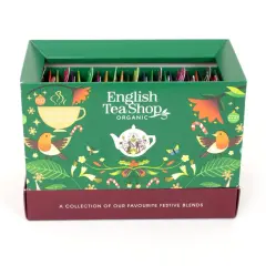 Zielony kalendarz adwentowy English Tea Shop z motywami świątecznymi, ptaszkami i liśćmi. W środku rzędy paczuszek z herbatą.