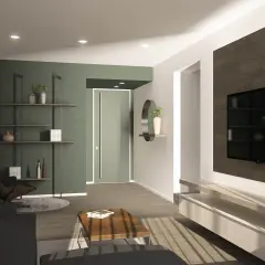 Un soggiorno moderno con parete verde, mensole, poltrona e TV. Un'idea su come colorare una parete per un look sofisticato.