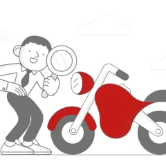 Mężczyzna z lupą bada motocykl. Pamiętaj, co grozi za jazdę bez przeglądu, by uniknąć problemów.