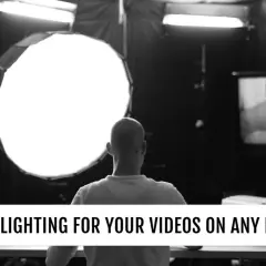 A person is filmed with professional lighting setup, showcasing the best lighting for video conferencing.