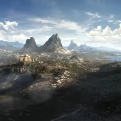Krajobraz z gry The Elder Scrolls 6: górzysty teren z zamkiem na klifie, morze w oddali.