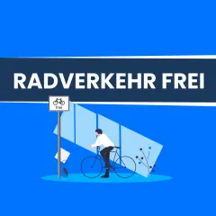 Radverkehr frei! Ein Mann fährt Fahrrad unter dem Zusatzzeichen 1022-10, das Radfahrern freie Fahrt signalisiert.