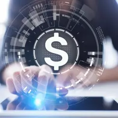 Une main touche un écran affichant un symbole dollar au centre d'une interface numérique futuriste, évoquant la gestion financière sur vm azure.