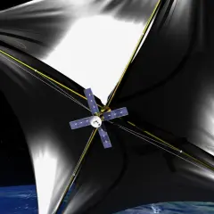 Statek kosmiczny z czarnymi żaglami, symbolizujący przełom w podróżach międzygwiezdnych, unosi się nad Ziemią. Breakthrough starshot.