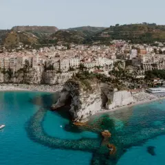 Tropea's stunning cliffs, beaches, and turquoise waters offer many things to do, from sunbathing to exploring the iconic rock formations.